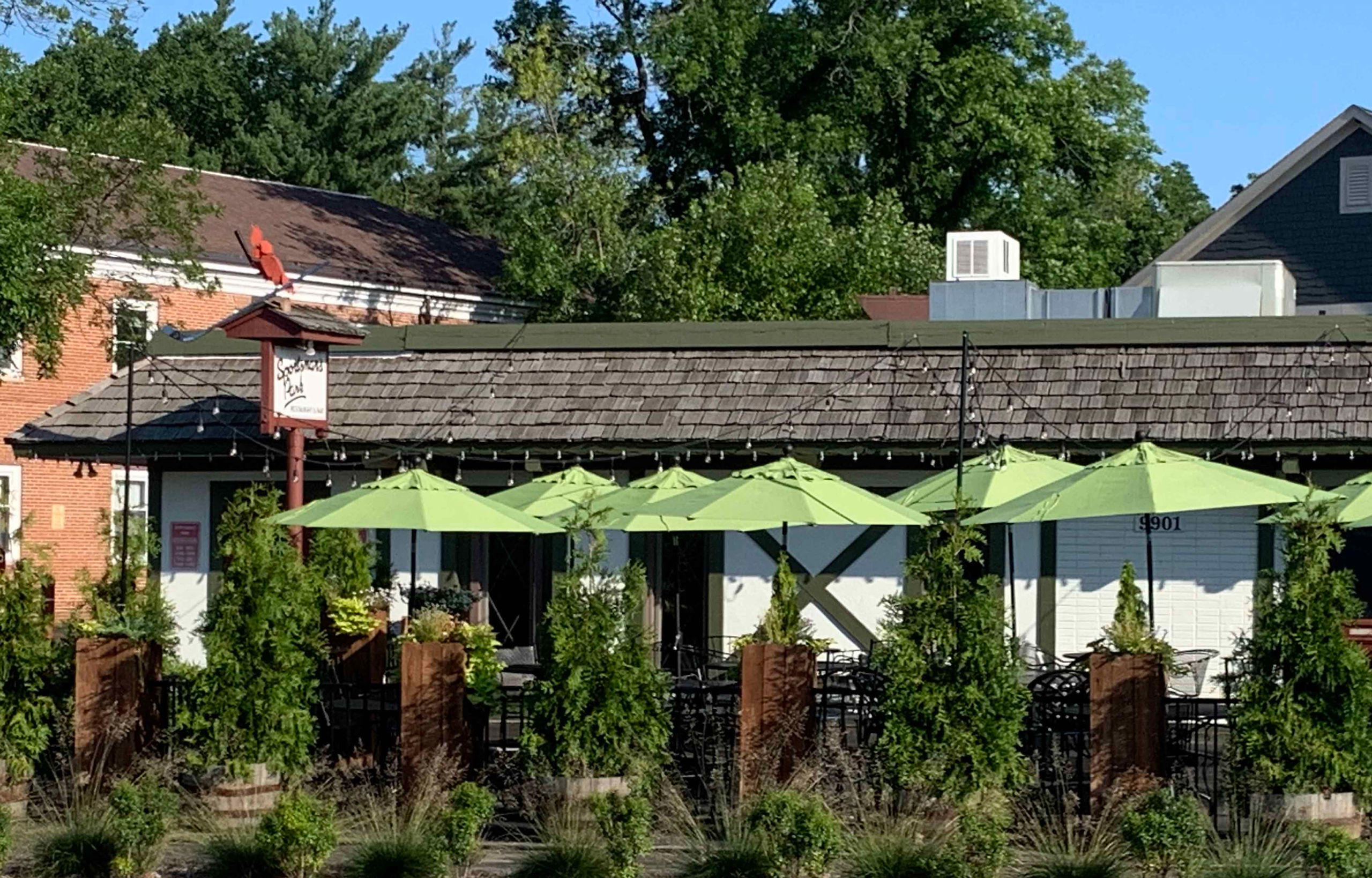 The patio and exterior of Sportsman's Park in Ladue